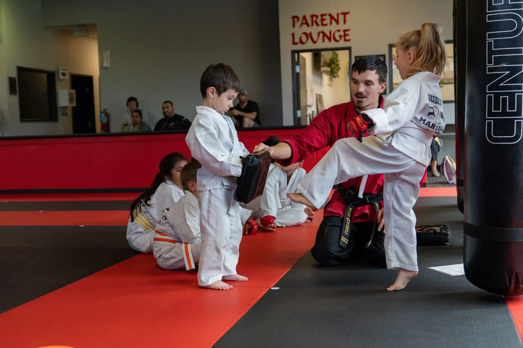 Big Ninjas students following their instructor's directions during a focused class at Guido's Martial Arts Academy in Clovis, CA