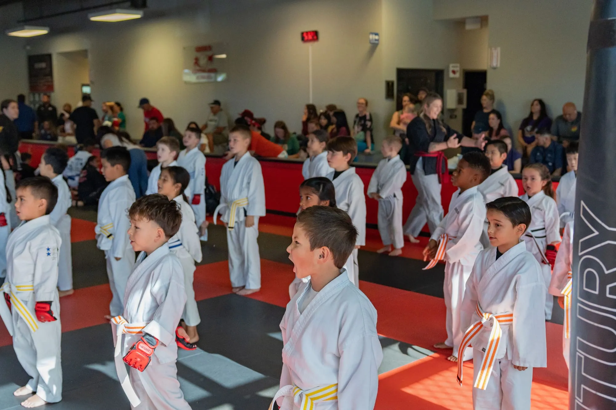 Big Ninjas student in a white gi holding a martial arts stance at Guido's Martial Arts Academy in Clovis, CA